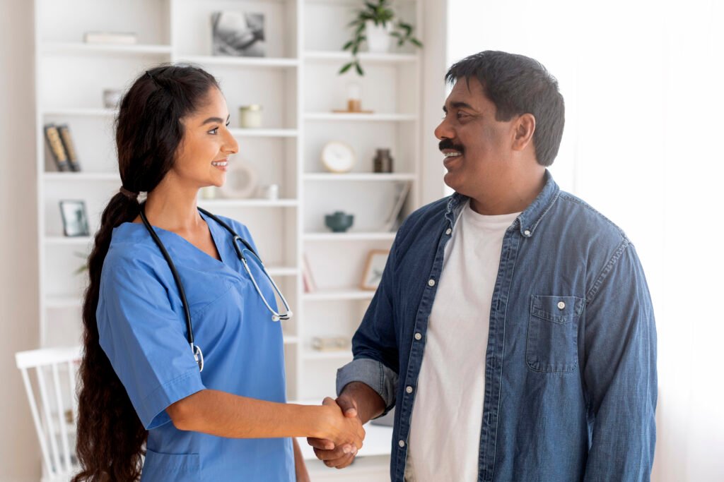 Nurse providing at home care to senior patient