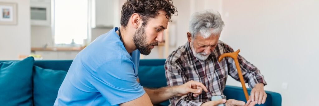 Professional caregiver assisting elderly parent at home in India